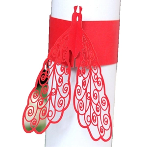 Laser-cut red peacock paper napkin rings with hollow design for wedding table decor
