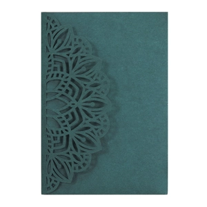 Detailed laser-cut mandala floral patterns on dark green specialty paper card