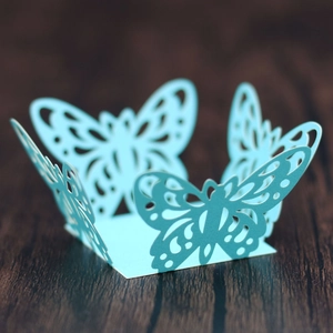 Detailed laser-cut light blue butterfly paper box for party favors and candy display