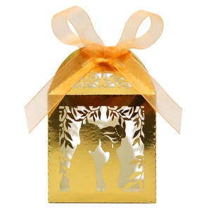 Laser-cut wedding favor box in gold with couple silhouette and orange silk ribbon