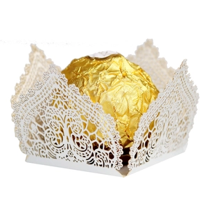 Elegant white laser-cut candy box with lace flower patterns for weddings and parties