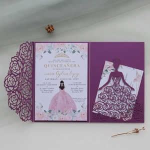 Macro detail of laser-cut purple floral invitation card with rose insert for Quinceañera