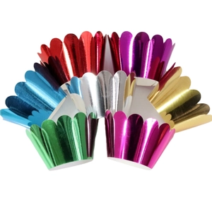 Set of 7 colorful metallic foil cupcake liners with laser-cut scalloped edges for baking
