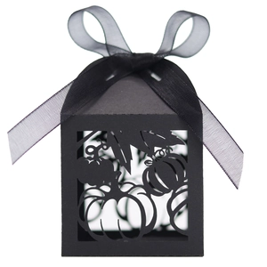 Detailed laser-cut pumpkin and maple leaf patterns on a black Halloween candy gift box