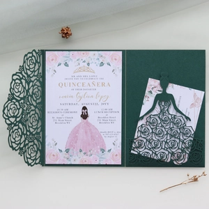 Detail of dark green laser-cut floral wedding invitation with rose pattern and inner card