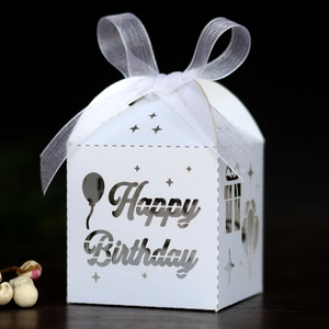 Elegant white laser-cut Happy Birthday house-shaped gift box with a white ribbon bow