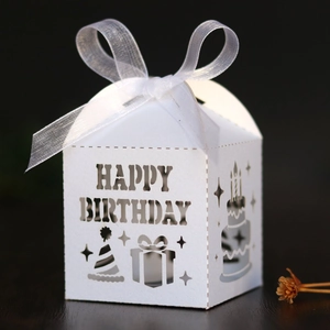 Laser cut Happy Birthday candy box in white cardstock with elegant ribbon bow