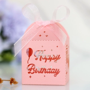Pink laser-cut Happy Birthday candy gift box with balloon patterns and white organza ribbon