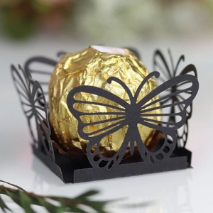 Detailed laser-cut butterfly hollow candy box in black paper with intricate lace decor
