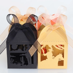 Laser cut laser hollow candy boxes with cowboy silhouette and decorative ribbon bows