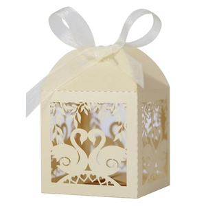 Elegant white laser-cut swan heart wedding favor box with organza ribbon bow decoration