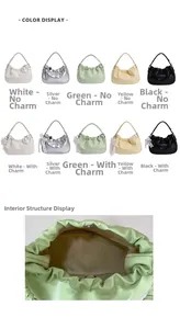 Detail view of the green dumpling bag showing its magnetic closure and inner zipper pocket