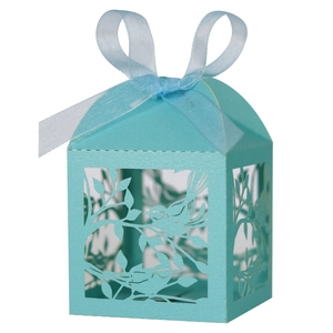 Sky blue laser-cut bird gift box with ribbon for wedding party favors and candies