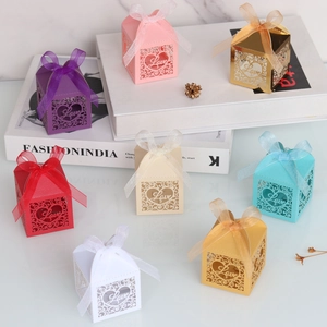 Laser cut favor boxes with heart LOVE design and ribbons in multiple colors