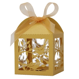 Detailed laser-cut lovebird pattern on gold pearlescent paper wedding favor box with ribbon