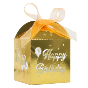 Golden laser cut Happy Birthday candy box with balloon pattern and orange ribbon bow