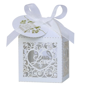 Elegant white laser-cut LOVE wedding candy box with silk ribbon and thank you tag