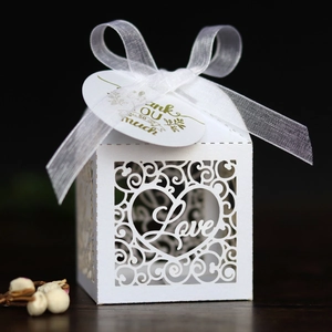 White laser-cut candy box with LOVE heart pattern, white ribbon and Thank You tag detail