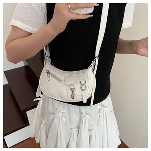 Chic white leather crescent bag with biker-style zippers and adjustable shoulder strap