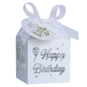 Detailed white laser-cut Happy Birthday gift box with silk ribbon and thank you tag