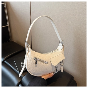 Detail of white lychee texture hobo bag with silver zipper and adjustable strap