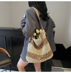 Detailed texture of the woven tote bag featuring a colorful ethnic style strap for women