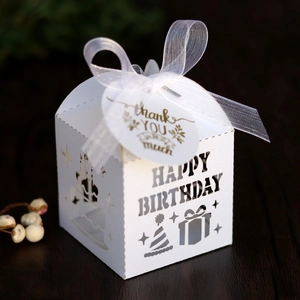 Detailed laser-cut Happy Birthday candy box with white ribbon and Thank You tag