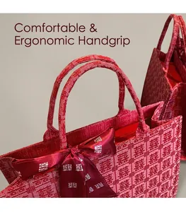 Detail of red Chinese wedding tote bag with double happiness jacquard and round handle