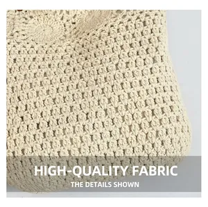 Close-up of beige crochet knit texture and detailed mesh pattern on the woven bag