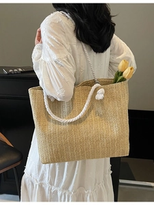 Large capacity straw tote bag with white rope handles and decorative yellow tulips