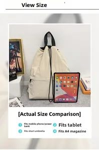 Große Kordelzug-Tragetasche in Off-White zeigt Platz für A4-Magazine und Tablets