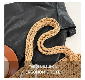 Detailed close-up of khaki chunky knit woven tote bag with thick comfortable handle