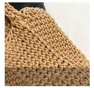 Detailed close-up of khaki woven bag texture showing premium thick rope craftsmanship