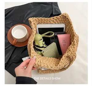 Interior view of light brown woven tote showing large capacity for daily essentials