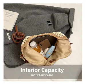 Macro shot showing internal capacity of the beige woven tote with leather strap