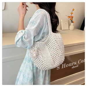 Hand-woven tote bag in cream white cotton cord with a cute lamb doll pendant detail