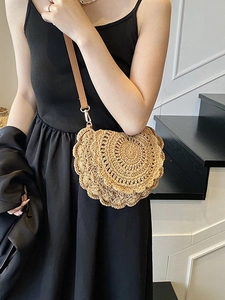 Summer woven knit saddle bag with wave edge and brown leather strap on model