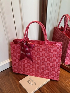 Red Chinese wedding tote bag with jacquard Xi character patterns and elegant silk ribbon
