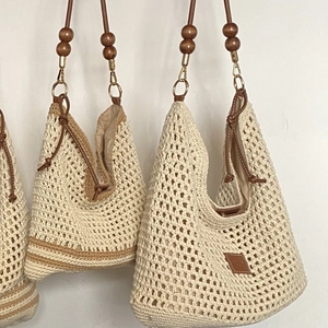 Handwoven hollow tote bag with beaded straps and inner lining for beach or daily use