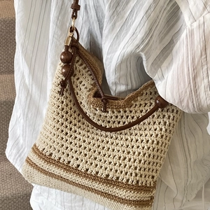 Large woven tote bag with hollow knit pattern, wood beads and leather straps