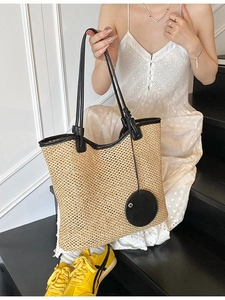 Large capacity woven straw tote bag with black leather handles for summer fashion