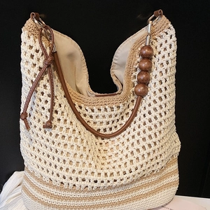 Large woven tote bag for women featuring hollow knit pattern and leather shoulder straps