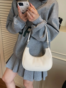 Chic white lychee leather crescent hobo bag for women with silver zipper and slim strap
