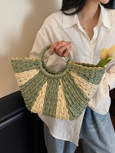 Contrast woven straw tote bag with chain detail and circular handles for beach holidays