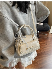 Chic beige bow handbag with lace trim and ribbon handle for women stylish daily commute