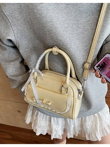 Cream bow Boston handbag with lace trim and check ribbon handle for daily commute