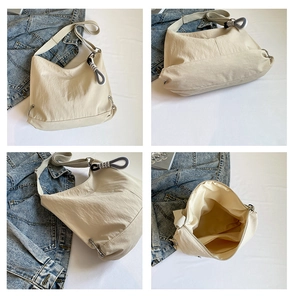 Détails du grand sac en toile avec poches intérieures et bandoulière réglable