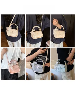 Multiple views showing bow accent shoulder bag in cream, pink, silver and blue colors