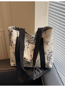 Minimalist tote bag with black ink bamboo prints and durable wide shoulder straps