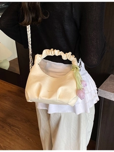 Ruched cloud dumpling bag in beige leather with silver chain and tulip charm